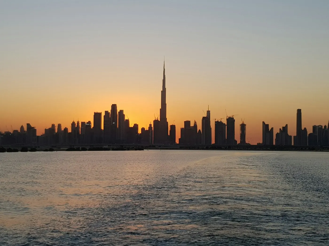 Gulf city skyline at sunset
